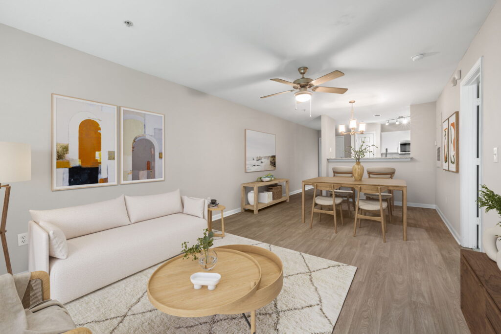 Living room with dining table and chairs in open concept floor plan