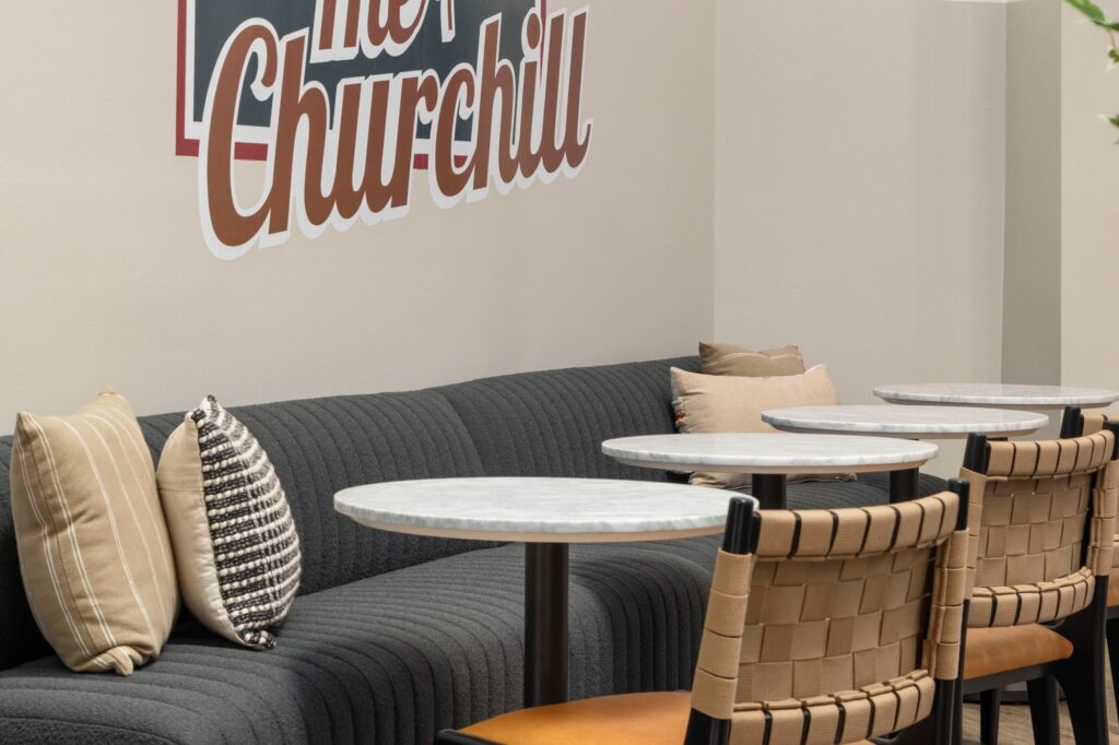 Lounge space with couch and table seating